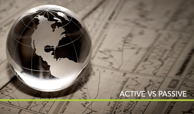 glass globe on sheets of investment data