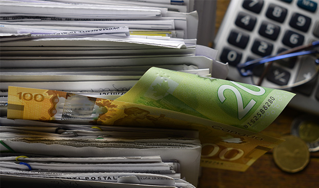 $20 bill and hundred $100 bill filed in paperwork